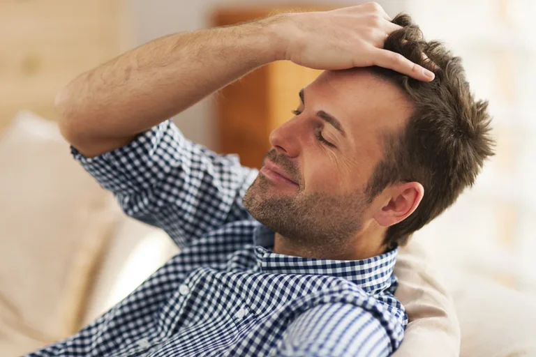 smiling-man-with-hand-hair